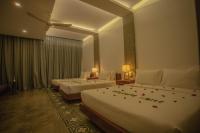 Tanei Angkor Resort and Spa客房内的一张或多张床位
