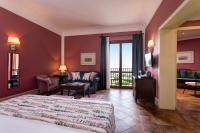 Hotel Baglio Oneto dei Principi di San Lorenzo - Luxury Wine Resort客房内的一张或多张床位