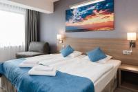 WIND Hotel客房内的一张或多张床位