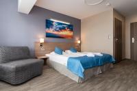 WIND Hotel客房内的一张或多张床位
