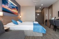 WIND Hotel客房内的一张或多张床位