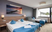 WIND Hotel客房内的一张或多张床位