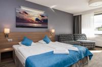 WIND Hotel客房内的一张或多张床位