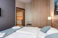 WIND Hotel客房内的一张或多张床位