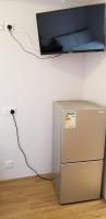 New hoover hostel的电视和/或娱乐中心