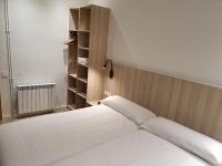 Hostal BESTPRICE Barcelona Stadium客房内的一张或多张床位