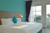 AVI Pangkor Beach Resort客房内的一张或多张床位