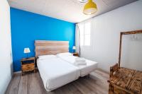 Safestay Madrid Central客房内的一张或多张床位