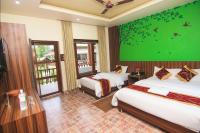 Jungle Safari Lodge- Serenity in the Wild客房内的一张或多张床位