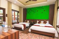 Jungle Safari Lodge- Serenity in the Wild客房内的一张或多张床位