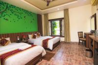 Jungle Safari Lodge- Serenity in the Wild客房内的一张或多张床位