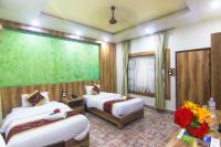 Jungle Safari Lodge- Serenity in the Wild客房内的一张或多张床位