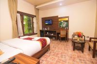 Jungle Safari Lodge- Serenity in the Wild客房内的一张或多张床位