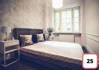 Sienna 41 Boutique Warsaw Apartments客房内的一张或多张床位
