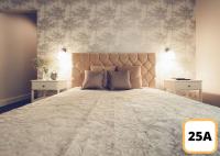 Sienna 41 Boutique Warsaw Apartments客房内的一张或多张床位
