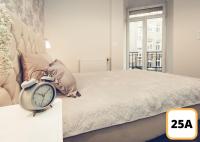 Sienna 41 Boutique Warsaw Apartments客房内的一张或多张床位