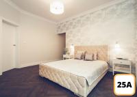 Sienna 41 Boutique Warsaw Apartments客房内的一张或多张床位