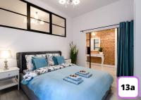 Sienna 41 Boutique Warsaw Apartments客房内的一张或多张床位