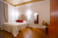 Boutique Hotel Puccini客房内的一张或多张床位