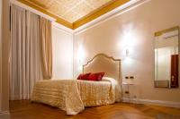 Boutique Hotel Puccini客房内的一张或多张床位