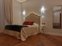 Boutique Hotel Puccini客房内的一张或多张床位