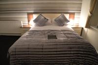 Lauriston &amp; Lawton Court Hotel客房内的一张或多张床位