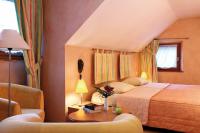 Hôtel A la Vignette - COLMAR-NORD客房内的一张或多张床位