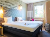 ibis Baden Neuenhof客房内的一张或多张床位