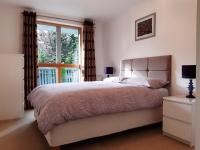 Stylish Wembley Stadium and OVO Arena Apartment, London客房内的一张或多张床位