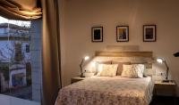 Urban House Siurot 33客房内的一张或多张床位