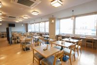 多美迎津酒店餐厅或其他用餐的地方