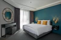 Hotel Alice and Trunk客房内的一张或多张床位