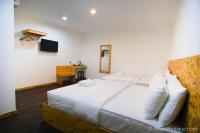 Mesra Boutique Hotel客房内的一张或多张床位