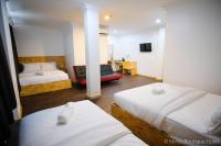 Mesra Boutique Hotel客房内的一张或多张床位