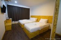 Mesra Boutique Hotel客房内的一张或多张床位