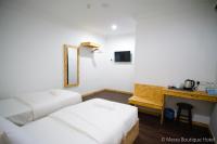 Mesra Boutique Hotel客房内的一张或多张床位