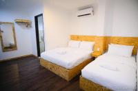 Mesra Boutique Hotel客房内的一张或多张床位