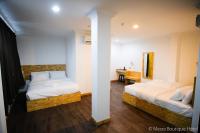 Mesra Boutique Hotel客房内的一张或多张床位