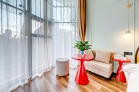Happy Dragon City Culture Hotel-Tianjin Draum Tower &amp; Dayuecheng shopping mall客房内的一张或多张床位