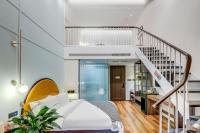 Happy Dragon City Culture Hotel-Tianjin Draum Tower &amp; Dayuecheng shopping mall客房内的一张或多张床位