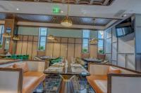 Happy Dragon City Culture Hotel-Tianjin Draum Tower &amp; Dayuecheng shopping mall餐厅或其他用餐的地方