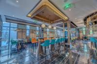 Happy Dragon City Culture Hotel-Tianjin Draum Tower &amp; Dayuecheng shopping mall餐厅或其他用餐的地方