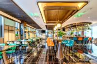 Happy Dragon City Culture Hotel-Tianjin Draum Tower &amp; Dayuecheng shopping mall餐厅或其他用餐的地方