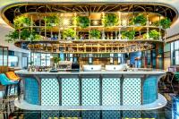Happy Dragon City Culture Hotel-Tianjin Draum Tower &amp; Dayuecheng shopping mall餐厅或其他用餐的地方