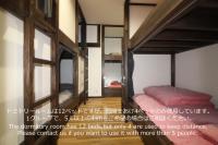 道草屋旅舎客房内的一张或多张床位