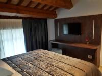 Agriturismo Cabrele客房内的一张或多张床位