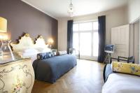 Das REGINA Boutiquehotel客房内的一张或多张床位