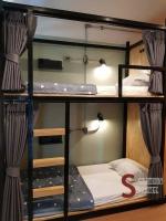 Station8 Hostel客房内的一张或多张床位