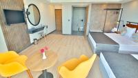 Ramira Joy Hotel客房内的一张或多张床位