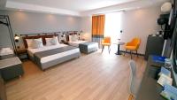 Ramira Joy Hotel客房内的一张或多张床位